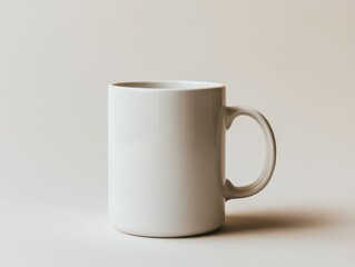 Obraz premium Blank white mug mockup on a plain neutral background showcasing a simple design