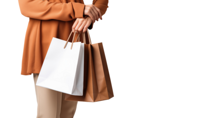 Festive season excitement with a woman carrying red and multiple shopping bags, symbolizing holiday shopping, cut out.