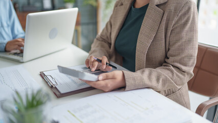 business man Auditor or internal revenue service staff checking annual financial statements company Audit  Accounting tax.