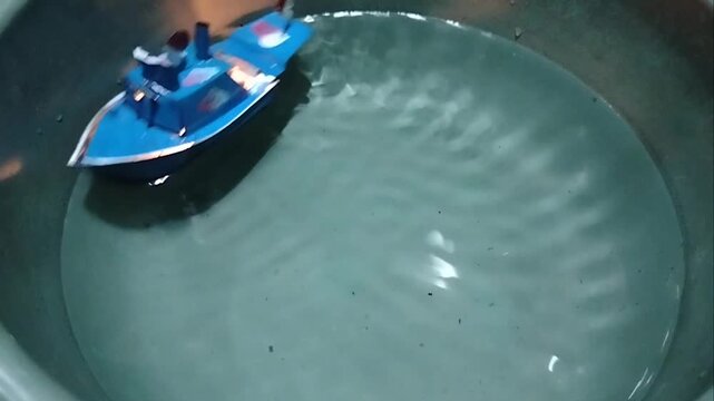 A traditional toy boat in a toy store. This is an old toy that many children played with in the 80s and 90s.