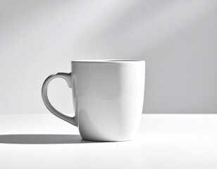 Empty white mug on white surface, soft shadows