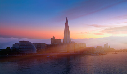 Skyline of London with Thames River at sunset - United Kingdom