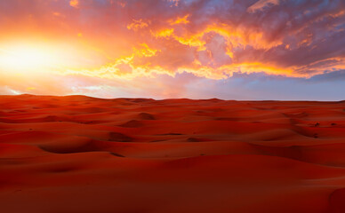 Sand dunes in the Sahara Desert at amazing sunrise, Merzouga, Morocco - Orange dunes in the desert of Morocco - Sahara desert, Morocco