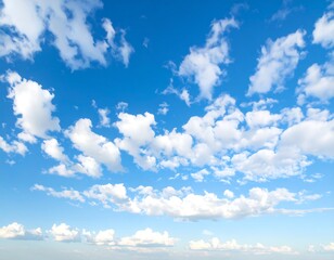 Obraz premium A vast expanse of a clear blue sky dotted with fluffy white clouds