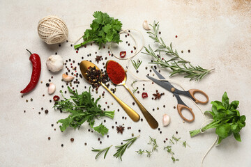 Composition with herbs, threads, scissors and spoons of spices on white grunge background