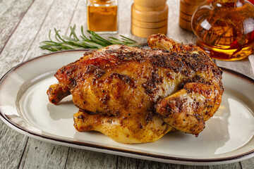Baked in oven whole chicken with spices