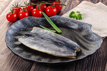 Salted herring fillet with skin