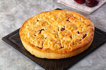Sweet homemade pie with plums