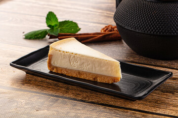 Classic delicous cheesecake slice served mint