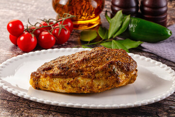Baked chicken breast with spices and herbs