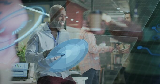 Mature business analyst taking coffee sip and initiating rotating data disk for data analysis