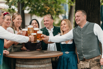 Friends enjoy beer mugs in traditional Bavarian beer garden celebrating German culture friendship Oktoberfest leisure and festive heritage