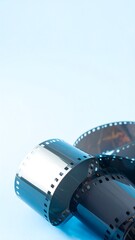Film rolls on a light blue background