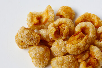 Crispy pork cracklings, a crunchy savory snack.
