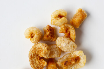 Crispy pork cracklings, a crunchy savory snack.