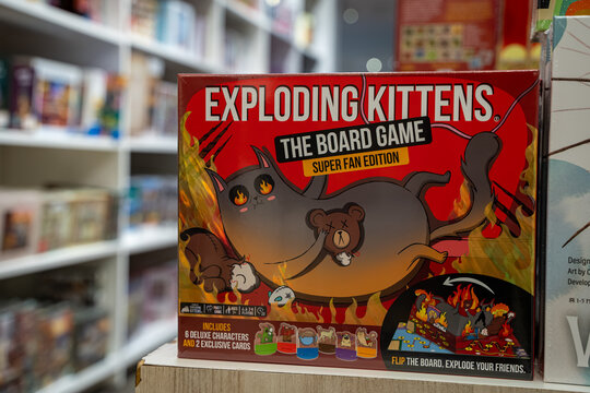 Exploding Kittens Super Fan Edition card game box on store shelf. Toronto, Canada - September 24, 2025.