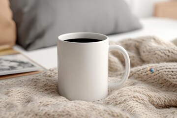 Warm Coffee Cup on Cozy Knit Blanket in Relaxed Living Space