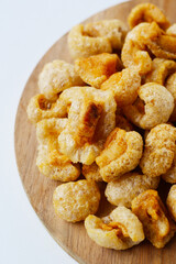 Crispy pork cracklings, a crunchy savory snack.