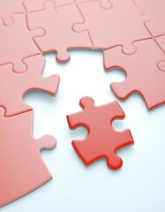 Obraz premium A single red puzzle piece sits separate from a nearly complete puzzle