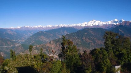 Panoramic view of Chaukhamba, a mountain massif in the Gangotri Group of the Garhwal Himalayas, as seen from the Deoriatal Trek in Uttarakhand, India.