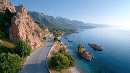 Winding Coastal Road Aerial View with Rocky Cliffs and Azure Sea on Sunny Day Cinematic HDR Landscape