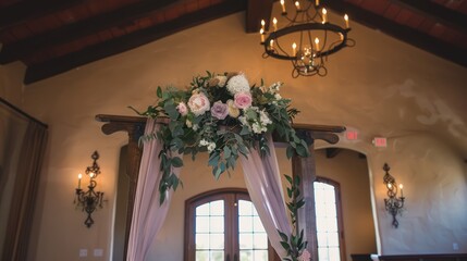Elegant Floral Wedding Arch with Pink and White Roses and Greenery in Rustic Indoor Venue