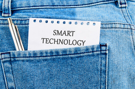 The concept of technology and development. Phrase, words, text SMART TECHNOLOGY API It's written on a piece of paper in my jeans pocket
