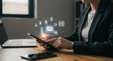 Businesswoman using tablet with digital marketing media icons, social media and business strategy concept