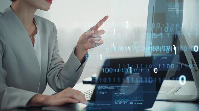 Woman using a PC in the office and digital technology concept