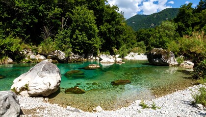 A serene river winding through a lush green valley. Crystal clear water reflects the surrounding trees