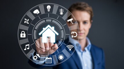 Smart home automation interface touched by professional in blue jacket