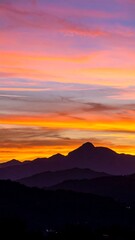 Fototapeta premium Mountain silhouettes at sunrise