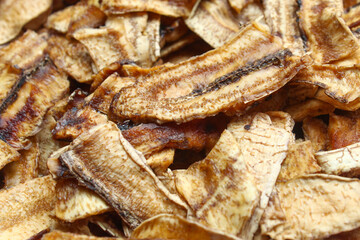 close up of dried banana slices, arranged randomly with a distinctive natural texture