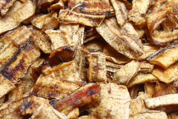 close up of dried banana slices, arranged randomly with a distinctive natural texture