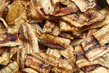 close up of dried banana slices, arranged randomly with a distinctive natural texture