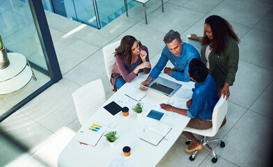 Team, discussion and people with laptop, boardroom or review ad campaign on web, browse and...