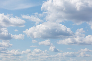 A blue sky with many clouds