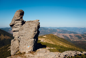 Rock Formation on Mountain Peak Under Clear Sky