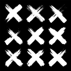 Obraz premium Grunge crosses, brush strokes, x mark, lines, ink smudges, hand-drawn scribble shapes. Handmade sketchy marks, acrylic stains, charcoal streaks. Paint textures, dry brush effect. Vector illustration