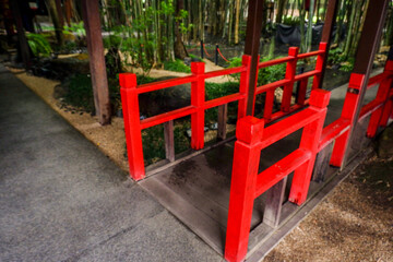 Japanese red wooden bridge with stones and pond,Japan traditional architecture for garden,Japanese,architecture,cultural aesthetics.