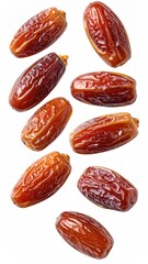 Dried dates arranged against a white background