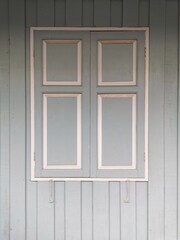 wooden door and window of wood house , pastel color , thailand