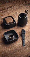 Dark gray/brown rectangular and rounded containers, leather wallet, chopsticks holder, and a watch on a wooden table