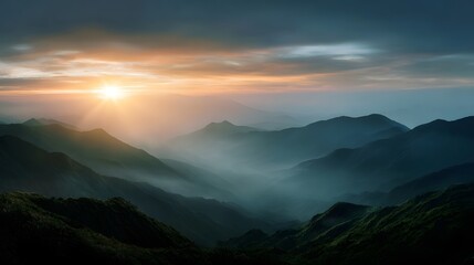 Fototapeta premium Serene mountain landscape at sunrise with golden light illuminating mist filled valleys and majestic peaks