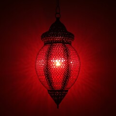 Fototapeta premium Red, ornate hanging lamp against deep red background