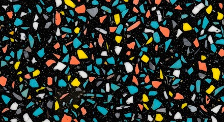 A terrazzo texture with a deep black epoxy resin base, densely embedded with colorful mosaic stone chips in various sizes. The chips include bright colors like turquoise, coral, yellow, and white, cre