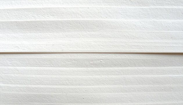 Close-up of layered, white, textured material.  Horizontal parallel ridges