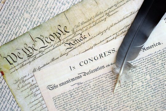 US Constitution with Declaration Of Independence and Quill Pen - Powered by Adobe