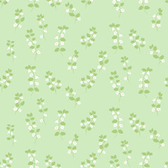 Seamless vector pattern with delicate white wildflowers on soft green background. Minimal botanical design for textiles, wallpapers, packaging, and spring themes