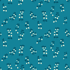 Seamless vector pattern with small white wildflowers and dark green leaves on teal background. Elegant botanical design for textiles, wallpapers, wrapping, and decor